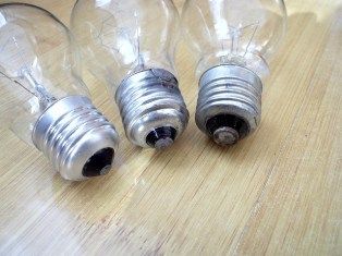 Base contact of three incandescent bulbs