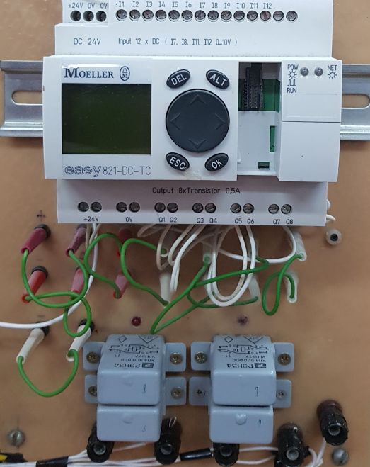 Four relays connected to Easy Moeller PLC outputs